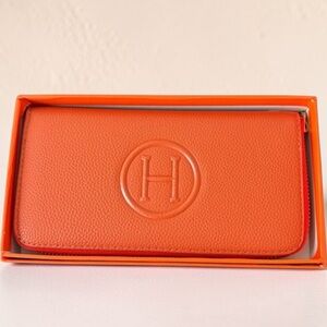 Monogram Orange H Long Zippy Wallet